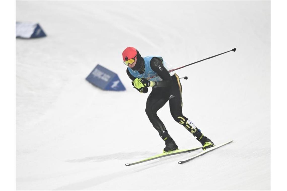 Kombinierer Geiger düpiert Rivalen - Mit Turbofinish zu Gold Julian Schmid belegte als drittbester Deutscher Platz acht. Foto: Hendrik Schmidt/dpa