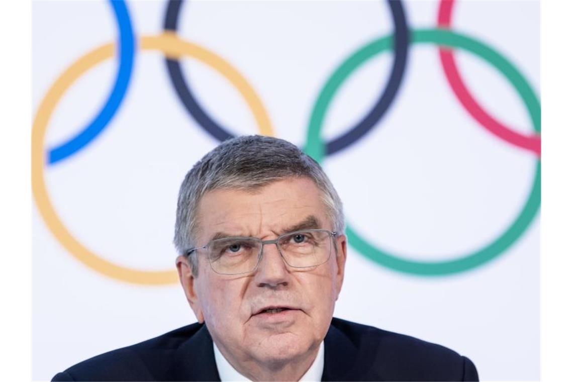 Kann sich Olympia ohne Zuschauer nicht vorstellen: IOC-Chef Thomas Bach. Foto: Jean-Christophe Bott/KEYSTONE/dpa