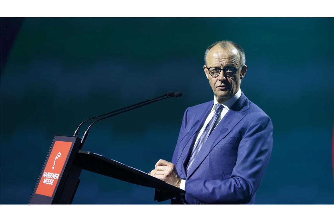 Kanzler Merz muss sich auf der Messe auch Kritik aus der Industrie anhören.