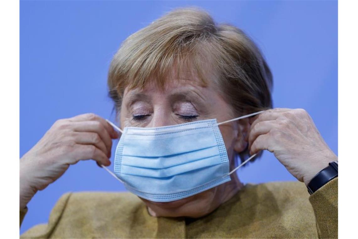 Kanzlerin Angela Merkel appelliert an die Bevölkerung : "Es kommt weiter auf jeden und jede einzelne an.". Foto: Odd Andersen/AFP/POOL/dpa