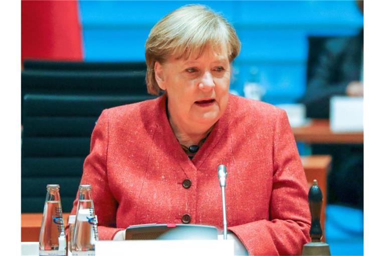 Kanzlerin Angela Merkel bezeichnet die Amtseinführung des neuen US-Präsidenten als „Feier der amerikanischen Demokratie“. Foto: Fabrizio Bensch/Reuters/Pool/dpa