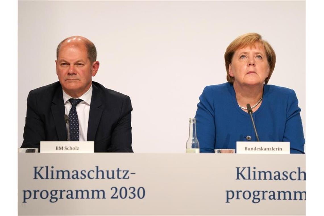 Kanzlerin Angela Merkel (CDU) und Finanzminister Olaf Scholz (SPD) nach der Sitzung des Klimakabinetts. Foto: Kay Nietfeld