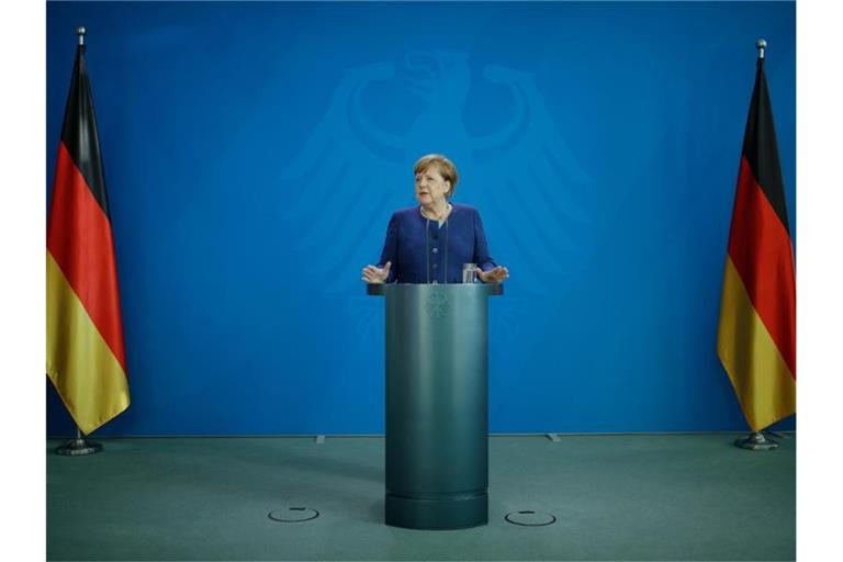 Kanzlerin Angela Merkel ist sich mit den Ländern einig geworden. Foto: Odd Andersen/AFP Pool/dpa