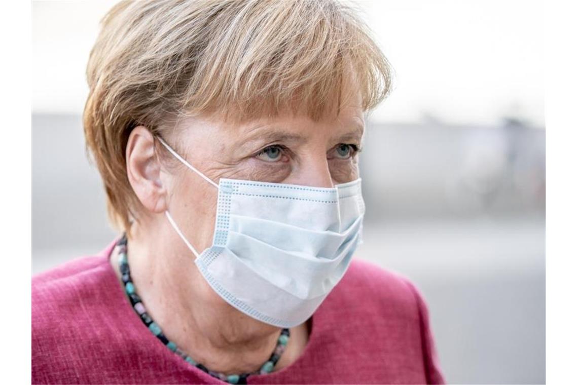 Kanzlerin Angela Merkel und die Länder-Chefs beraten heute über das weitere Vorgehen in der Corona-Pandemie. Foto: Michael Kappeler/dpa