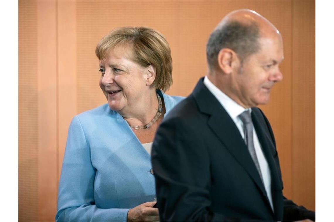 Kanzlerin Angela Merkel und Vizekanzler Olaf Scholz vor einer Kabinettssitzung im Kanzleramt. Foto: Michael Kappeler