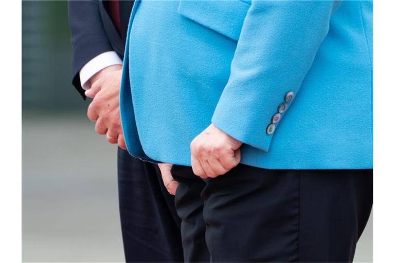 Kanzlerin Merkel hatte in den vergangenen Wochen mehrfach bei der Begrüßung anderer Regierungschefs Zitteranfälle erlitten. Foto: Michael Kappeler