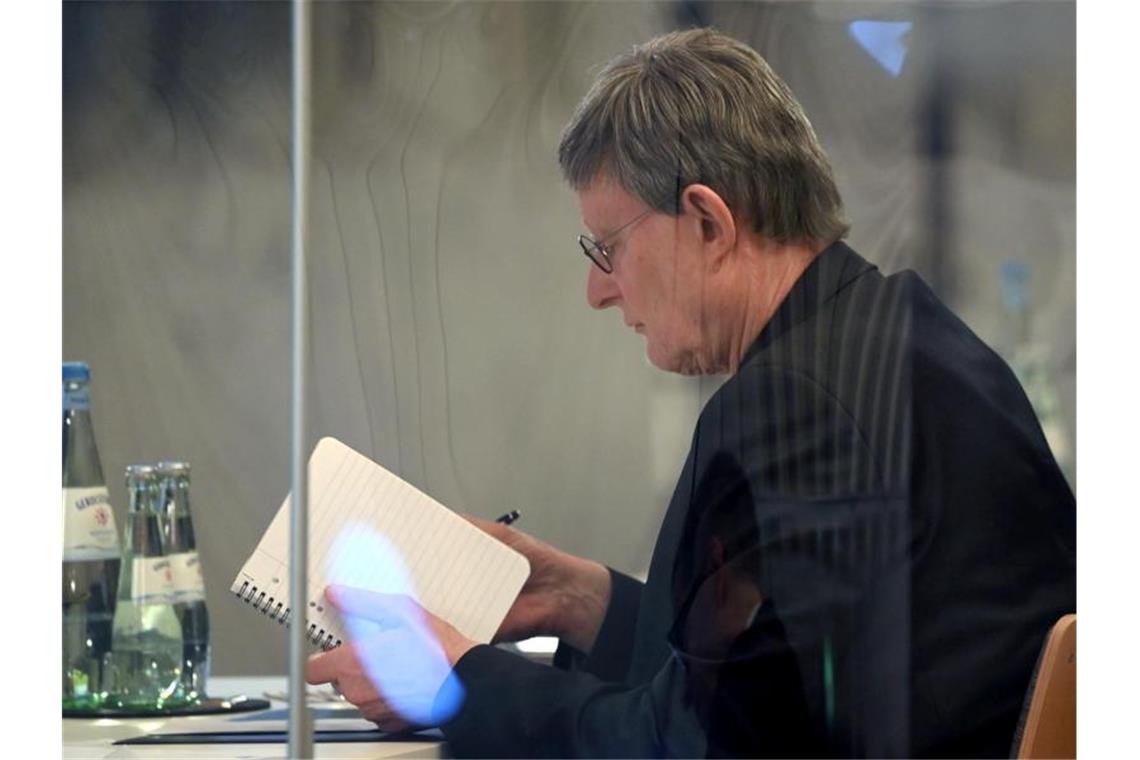 Nach Gutachten: Erzbischof Heße bietet Papst Amtsverzicht an Kardinal Rainer Maria Woelki, Erzbischof von Köln, nimmt an der Pressekonferenz zur Vorstellung des Gutachtens teil. Foto: Ina Fassbender/AFP Pool/dpa