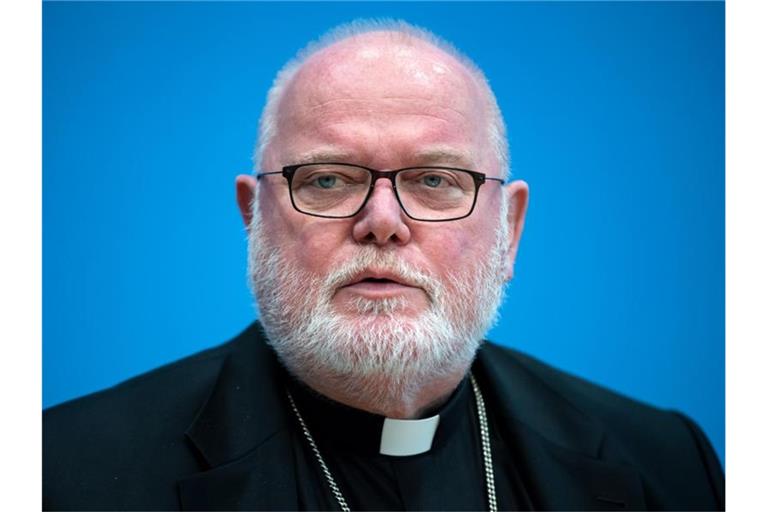 Kardinal Reinhard Marx: „In der Öffentlichkeit wird nun wahrgenommen, dass Juristen über Spitzfindigkeiten auf dem Rücken der Betroffenen streiten.“. Foto: Bernd von Jutrczenka/dpa