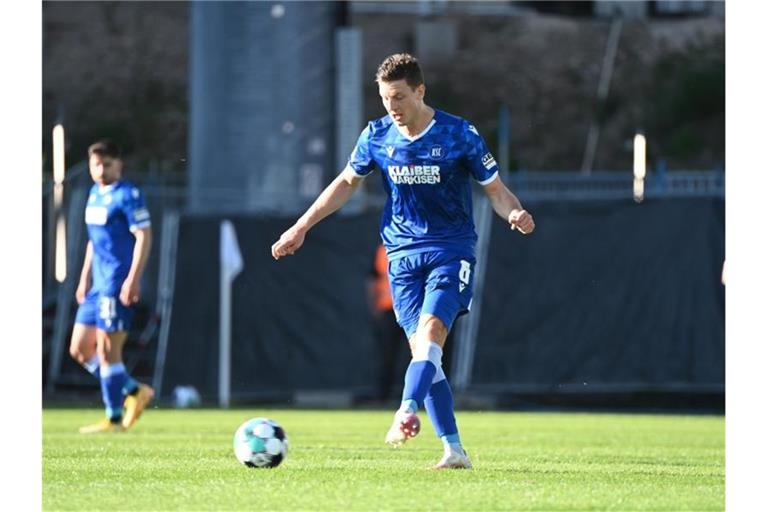 Kevin Wimmer am Ball. Foto: Uli Deck/dpa/Archivbild