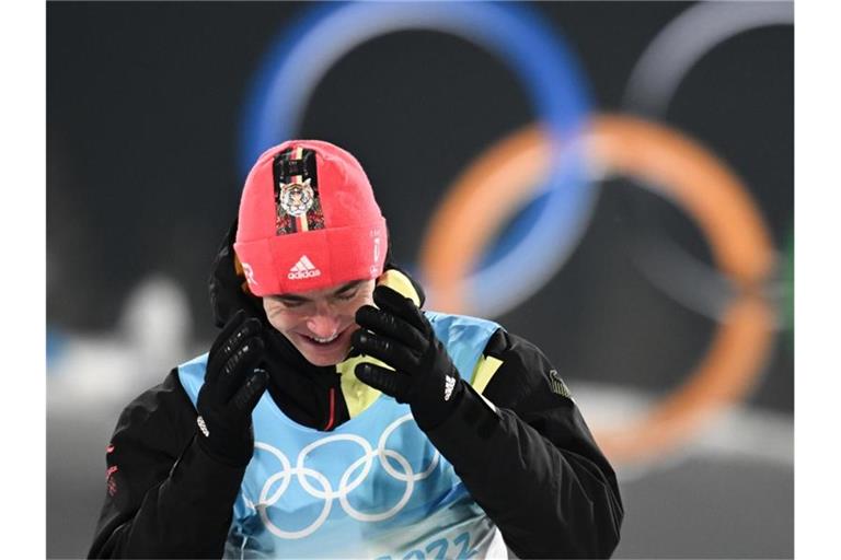 Kombinierer Vinzenz Geiger aus Deutschland gewinnt Gold bei den Winterspielen in Peking. Foto: Hendrik Schmidt/dpa