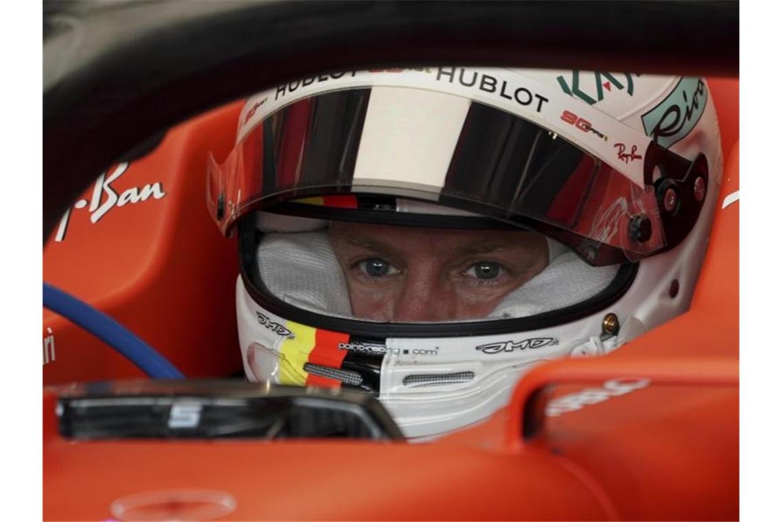 Konzentriert: Ferrari-Pilot Sebastian Vettel. Foto: Vincent Thian/AP/dpa