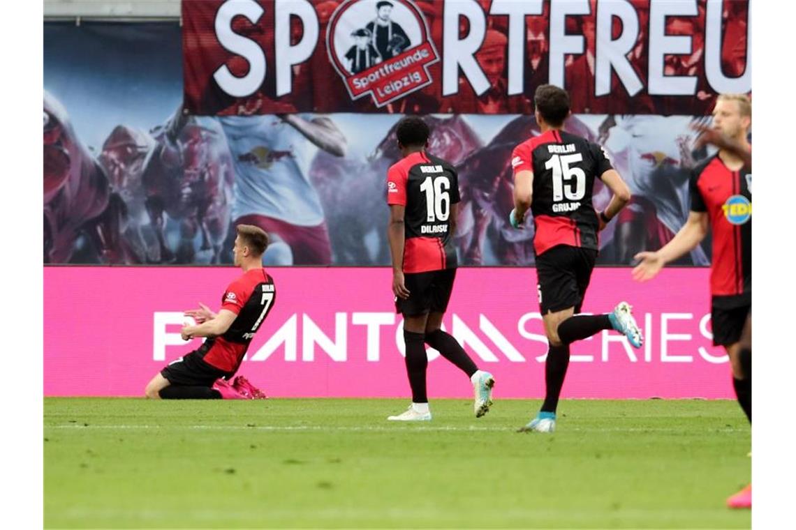 Krzysztof Piatek (l) bescherte Hertha BSC einen Punkt bei RB Leipzig. Foto: Alexander Hassenstein/Getty Images Europe/Pool/dpa
