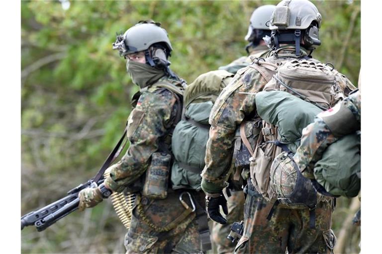 KSK-Soldaten bei einer Übung in Schleswig-Holstein. Foto: picture alliance / Carsten Rehder/dpa