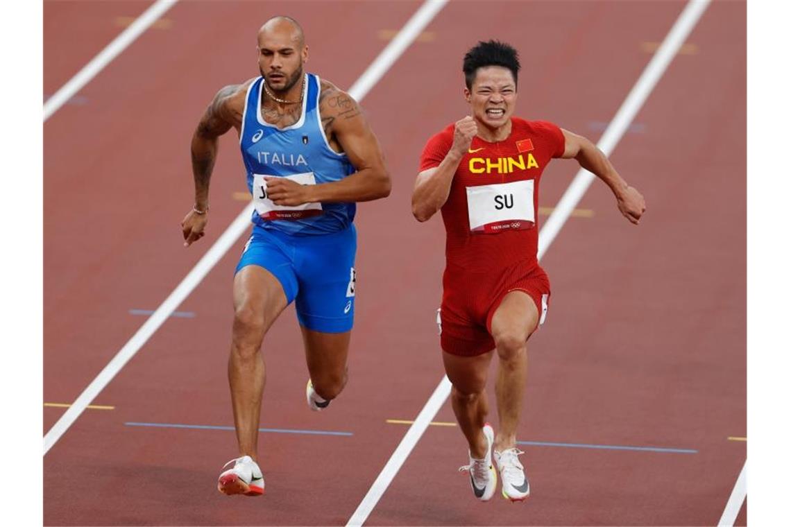 Lamont Marcell Jacobs (l) setzte sich im 100-Meter-Finale durch. Foto: Oliver Weiken/dpa