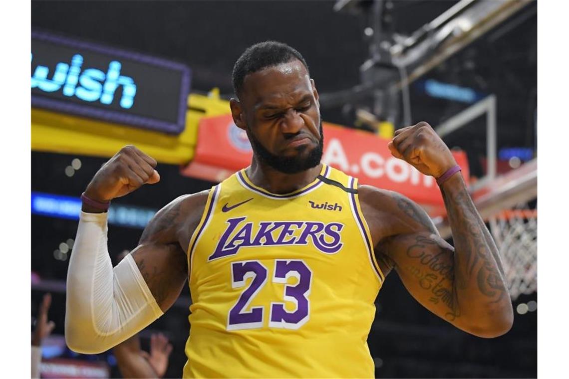 James verzichtet bei NBA-Neustart auf Botschaft auf Trikot LeBron James von den Los Angeles Lakers ist der Superstar der NBA. Foto: Mark J. Terrill/AP/dpa