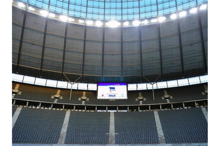 Leere Ränge in der Ostkurve des Olympiastadions. Foto: Soeren Stache/dpa-Zentralbild/ZB