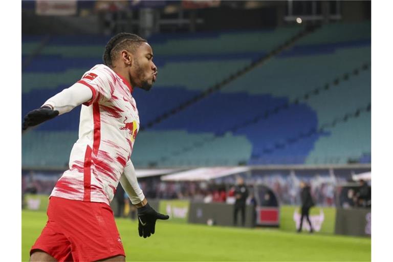 Leipzigs Christopher Nkunku jubelt nach seinem Treffer zum 3:1. Foto: Jan Woitas/dpa-Zentralbild/dpa