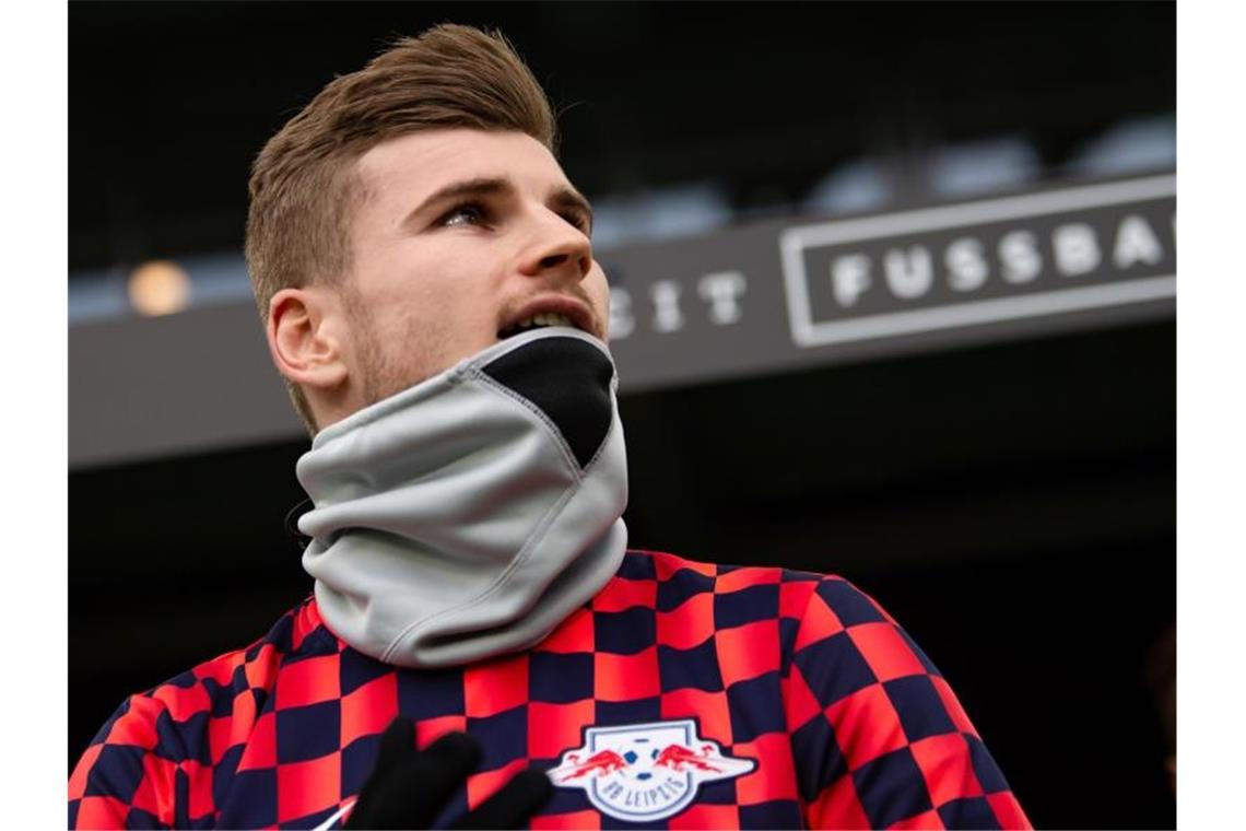 Leipzigs Timo Werner hat Respekt vor dem Erfolgsdruck bei Top-Teams. Foto: Swen Pförtner/dpa