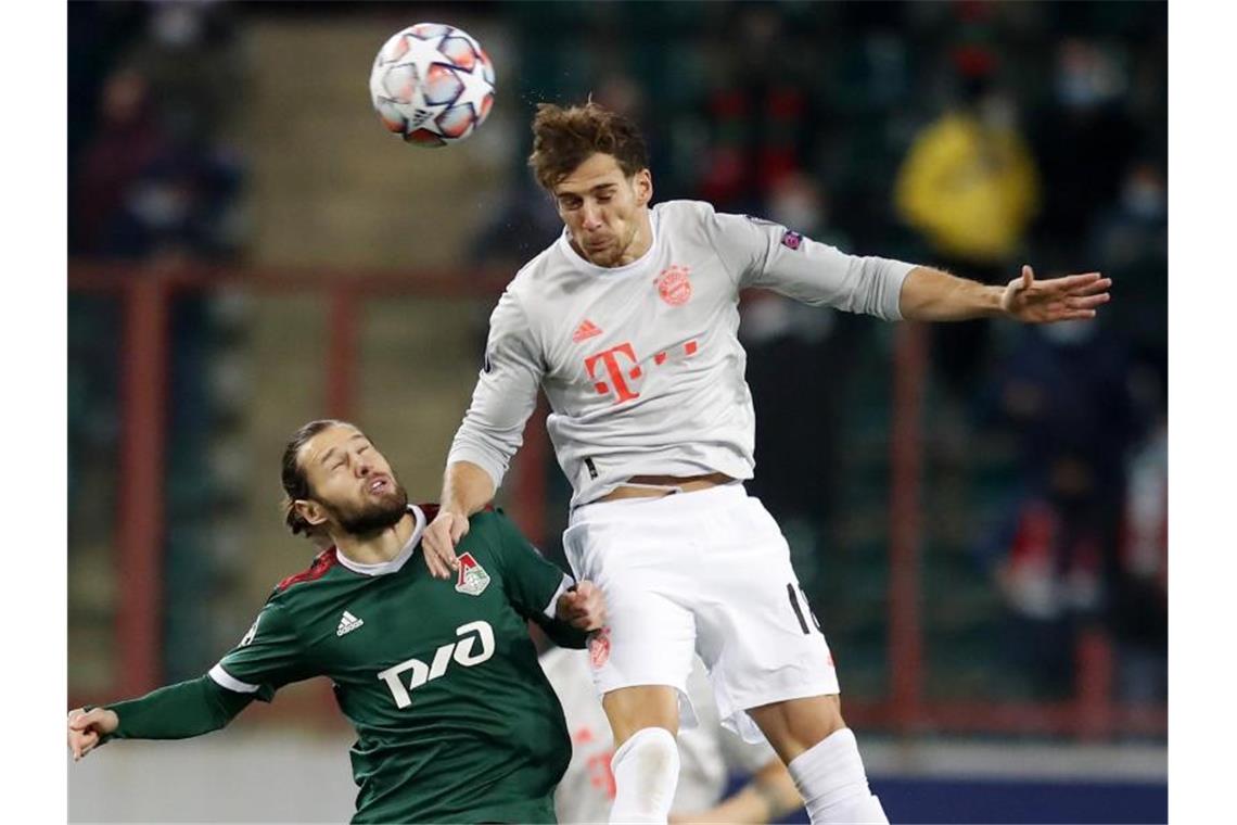 Leon Goretzka (r) köpfte Bayern früh in Moskau in Führung. Foto: Maxim Shemetov/Reuters Pool/dpa