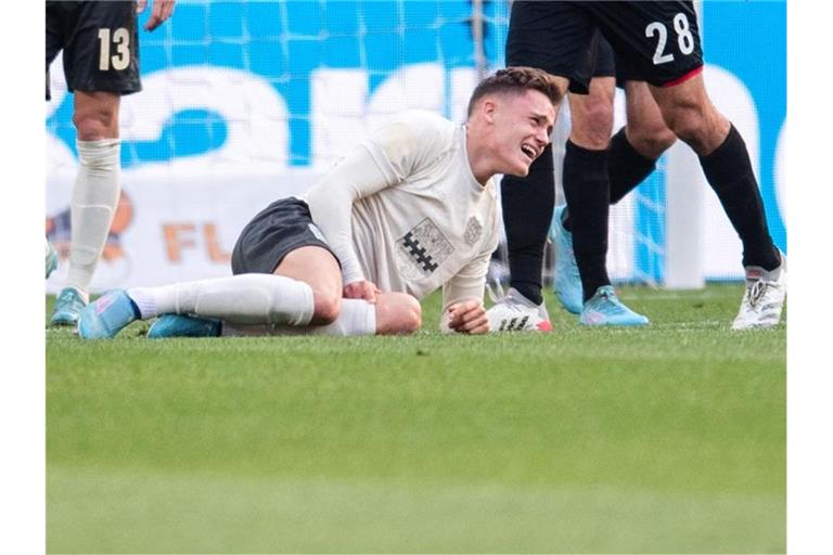 Leverkusens Florian Wirtz hat sich im Derby gegen Köln das Kreuzband gerissen. Foto: Marius Becker/dpa