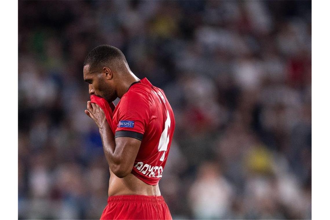 Völler trotz Demütigung kämpferisch: „Wir geben nicht auf“ Leverkusens Jonathan Tah nach der 0:3-Niederlage bei Juventus Turin. Foto: Marius Becker/dpa