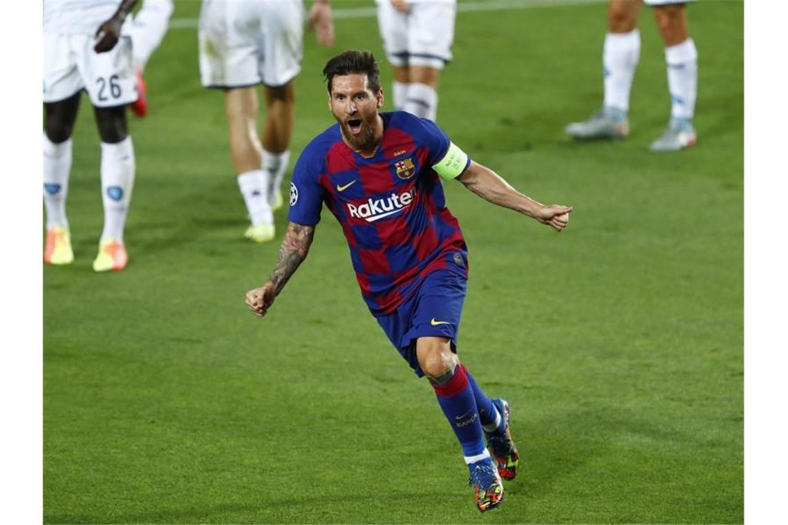 Lionel Messi bejubelt sein Tor zum 2:0 für den FC Barcelona gegen den SSC Neapel. Foto: Joan Monfort/AP/dpa