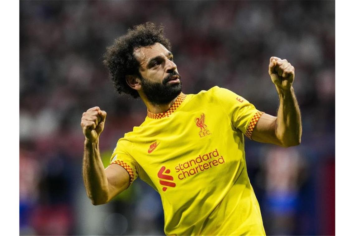 Liverpools Mohamed Salah jubelt nach einem Elfmetertor. Foto: Manu Fernandez/AP/dpa