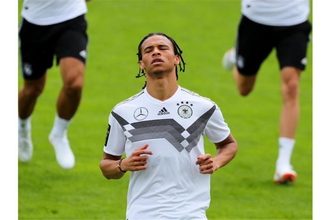 Überraschungsmann Löw: Von Odonkor bis Sané Löw schickte 2018 unter anderem Jungstar Leroy Sané nach Hause. Foto: Christian Charisius/dpa
