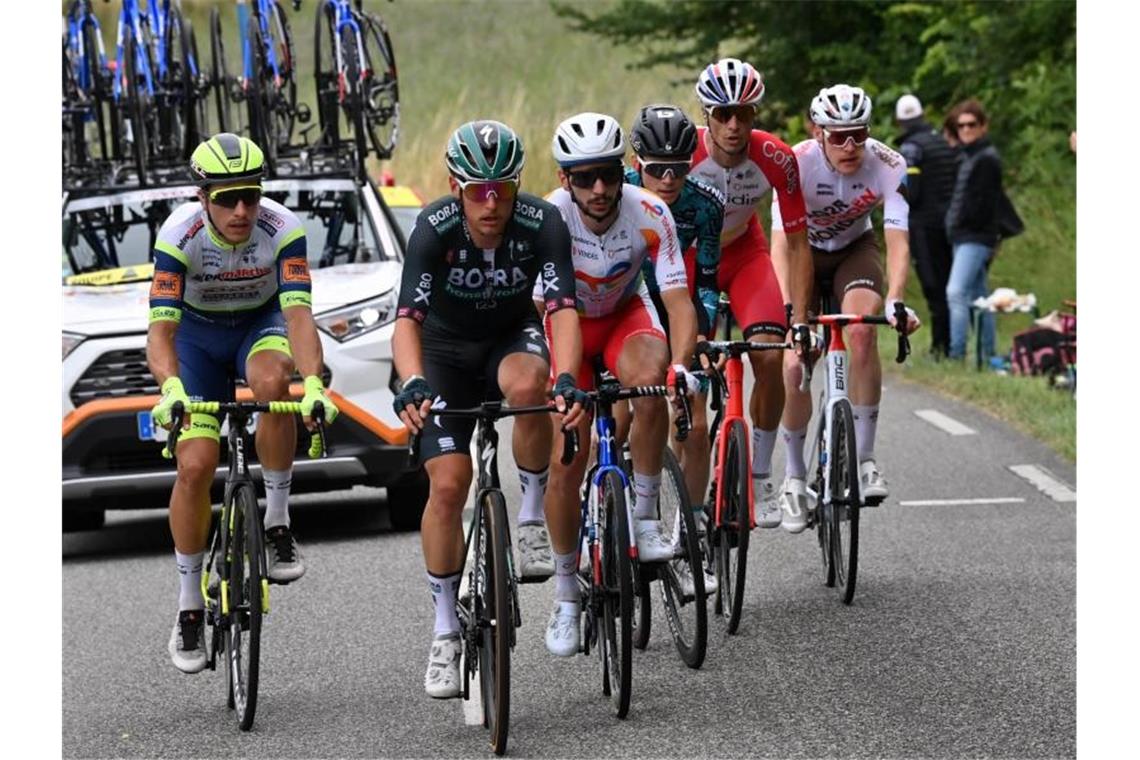 Dominator Pogacar siegt und ist am Gipfel platt Lukas Pöstlberger vom Team Bora-hansgrohe führt die erste Spitzengruppe der 17. Etappe an. Foto: David Stockman/BELGA/dpa