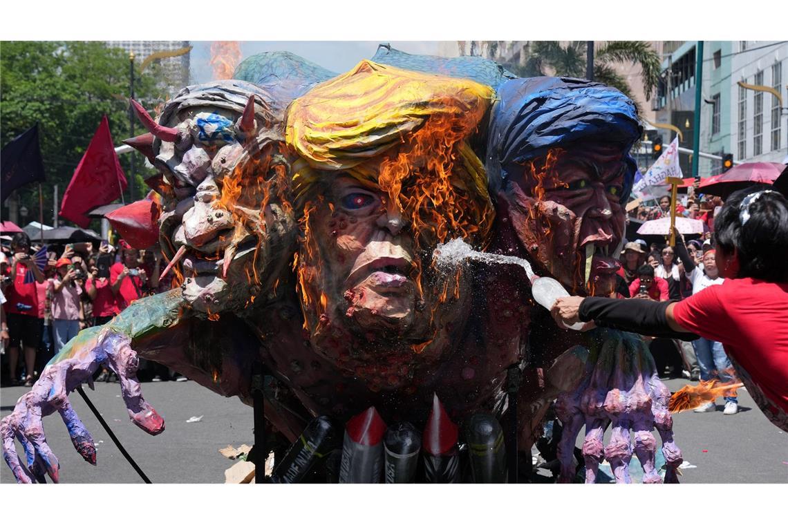 Maikundgebung in Manila: Demonstranten verbrennen Bildnisse von Trump, Netanjahu und Marcos Jr.