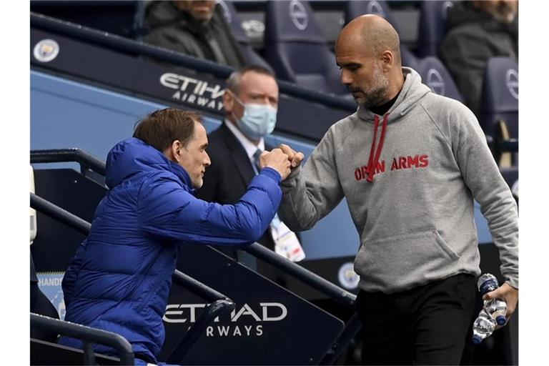 Man-City-Trainer Pep Guardiola (r) und Chelsea-Coach Thomas Tuchel sind befreundet. Foto: Shaun Botterill/Pool Getty/AP/dpa