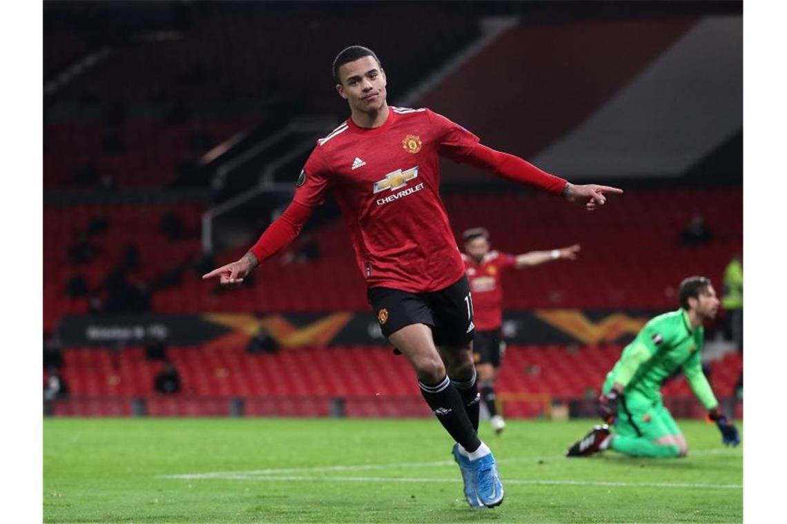 Manchester Uniteds Mason Greenwood freut sich über das sechste Tor im Spiel gegen AS Rom. Foto: Martin Rickett/PA Wire/dpa