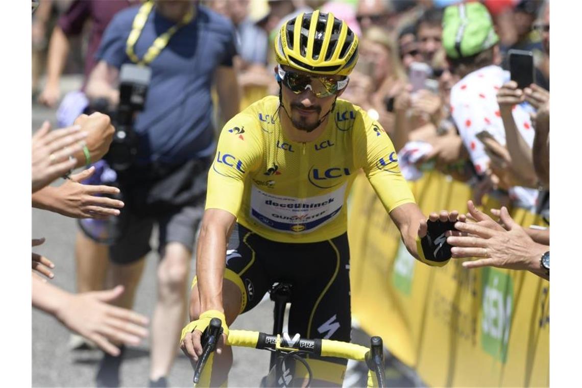 Erste Tour-Woche: Alaphilippe oben - Deutsche sieglos Mann in Gelb und Liebling der Fans: Julian Alaphilippe. Foto: Yorick Jansens/BELGA