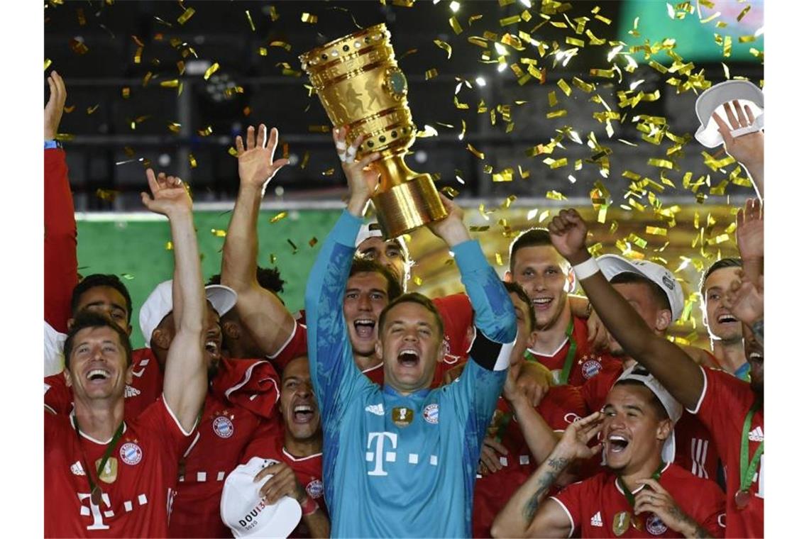 Bayerns Kiel-Schmach lässt Jäger vom Titel träumen Manuel Neuer und Co. müssen den DFB-Pokal im Jahr 2021 auf alle Fälle abgeben. Foto: John Macdougall/AFP/POOL/dpa