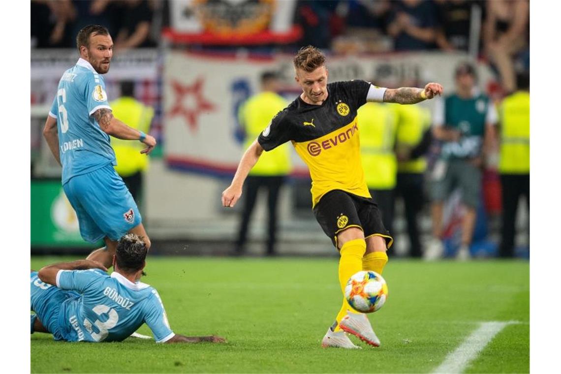 Marco Reus (r) traf für den BVB zur 1:0-Führung. Foto: Marius Becker