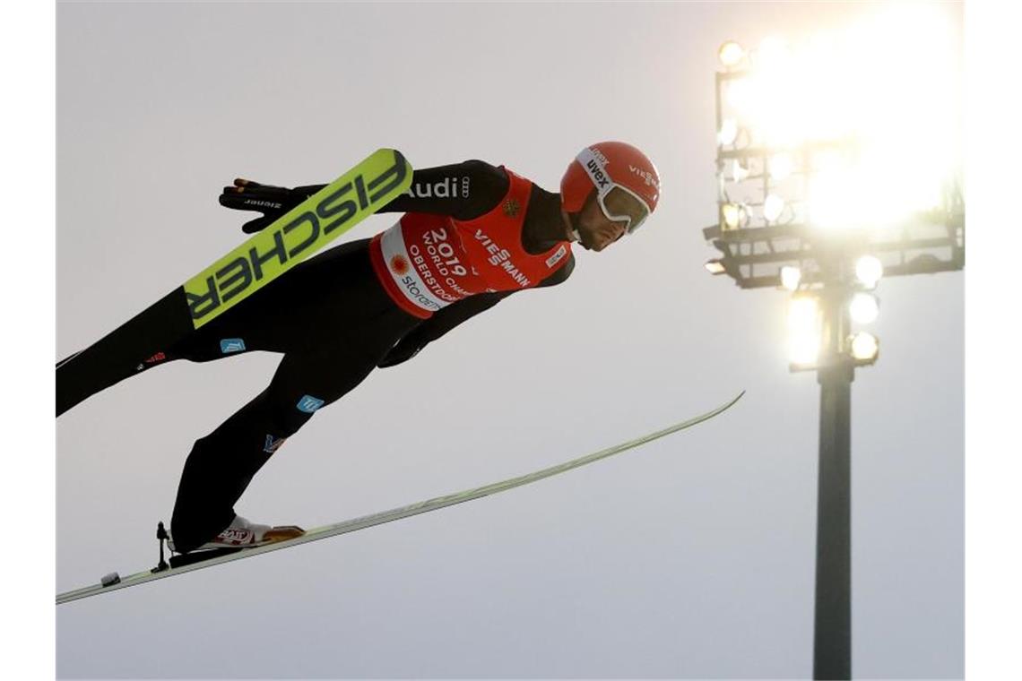 „Finale dahoam“ in Gold: Geiger veredelt verrückte WM-Reise Markus Eisenbichler sprang 135 und 138,5 Meter weit. Foto: Karl-Josef Hildenbrand/dpa