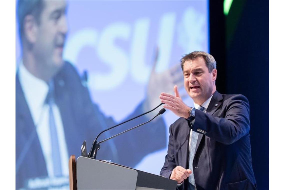 Markus Söder, CSU-Parteivorsitzender und Ministerpräsident von Bayern, spricht auf dem CSU-Parteitag in der Olympiahalle. Foto: Matthias Balk/dpa