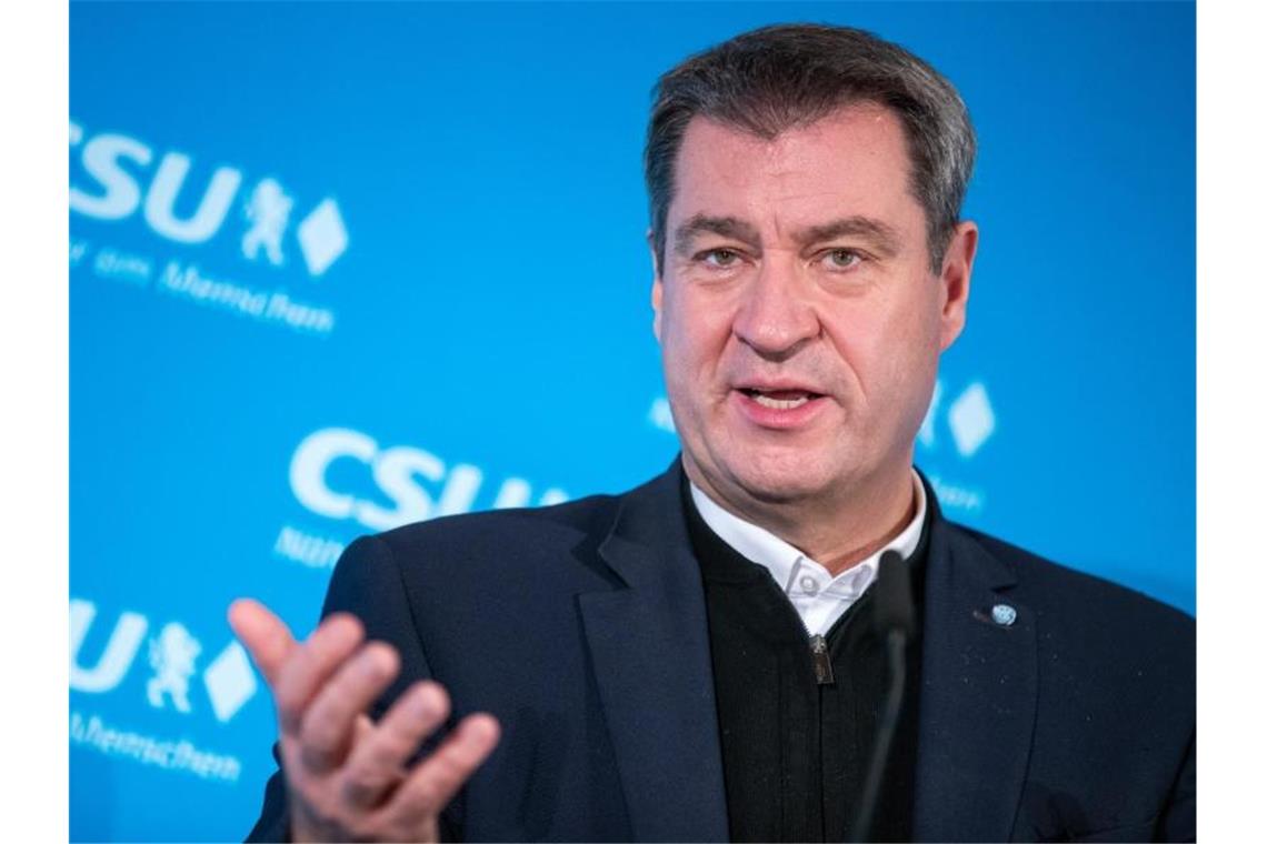 Markus Söder: „Die App ist leider bisher ein zahnloser Tiger. Sie hat kaum eine warnende Wirkung“. Foto: Daniel Karmann/dpa