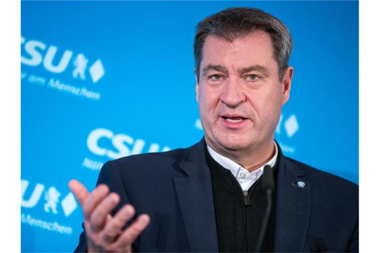 Markus Söder: „Die App ist leider bisher ein zahnloser Tiger. Sie hat kaum eine warnende Wirkung“. Foto: Daniel Karmann/dpa