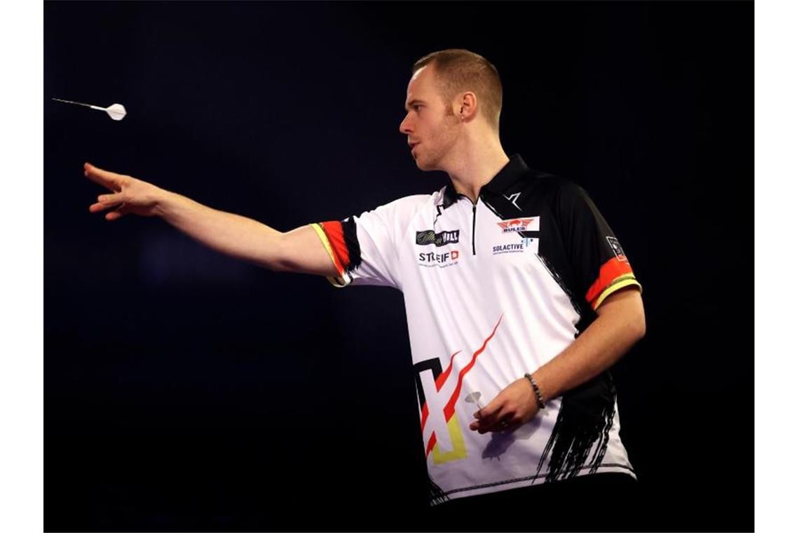 Nach Aus bei Darts-WM: Hoffnungsträger Hopp „wütend“ Max Hopp ist in der zweiten Runde der Darts-WM ausgeschieden. Foto: Steven Paston/PA Wire/dpa