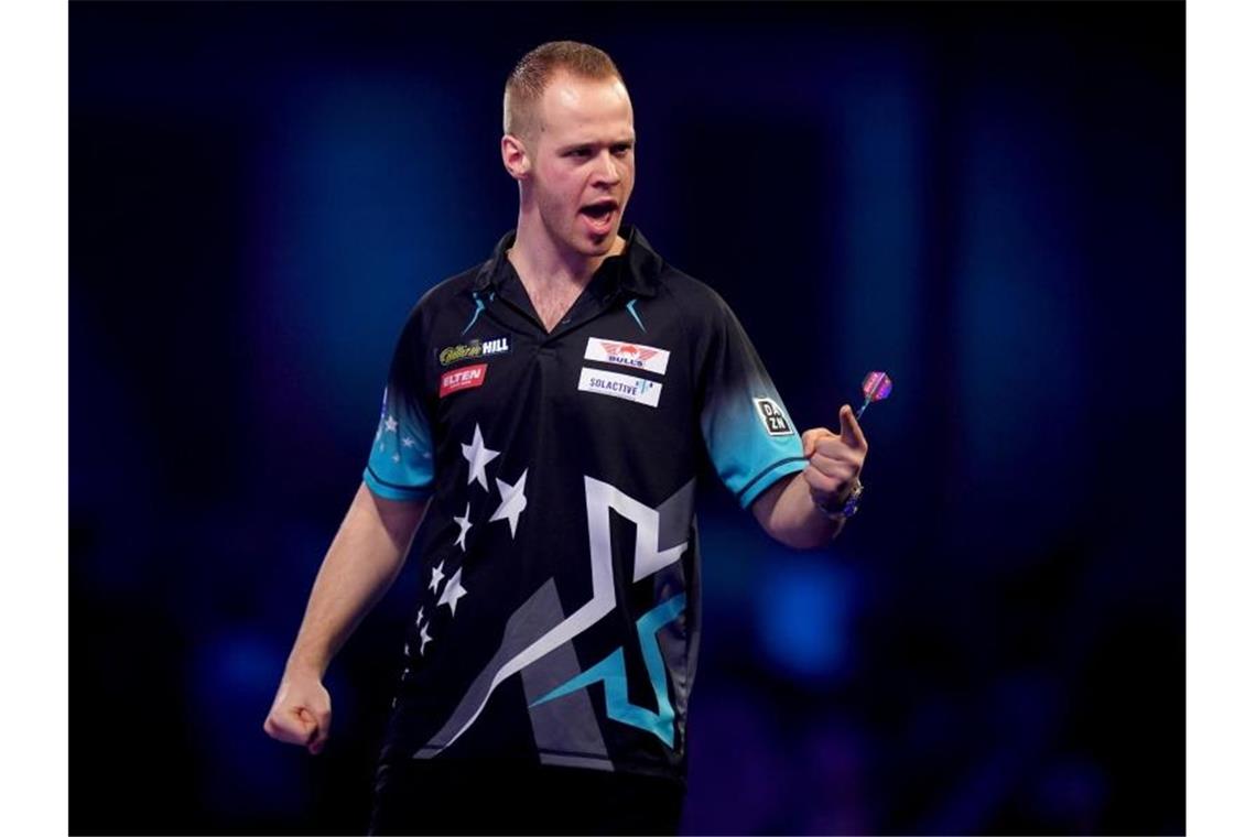 Hopp und Kurz: Achtelfinal-Träume bei Darts-WM Max Hopp jubelt nach einem Satzgewinn. Foto: John Walton/PA Wire/dpa