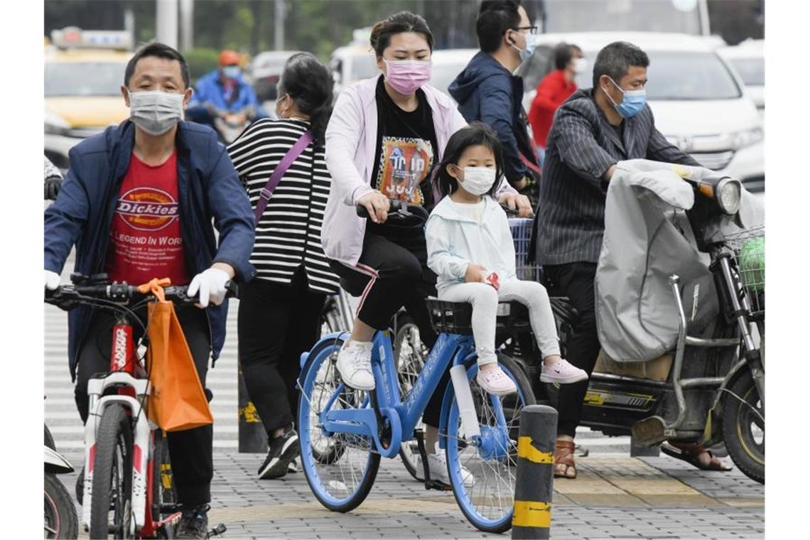 Zehn Millionen Menschen in Wuhan getestet - Kaum Infizierte Menschen in Wuhan, dem ersten Epizentrum der globalen Corona-Pandemie. Foto: -/kyodo/dpa