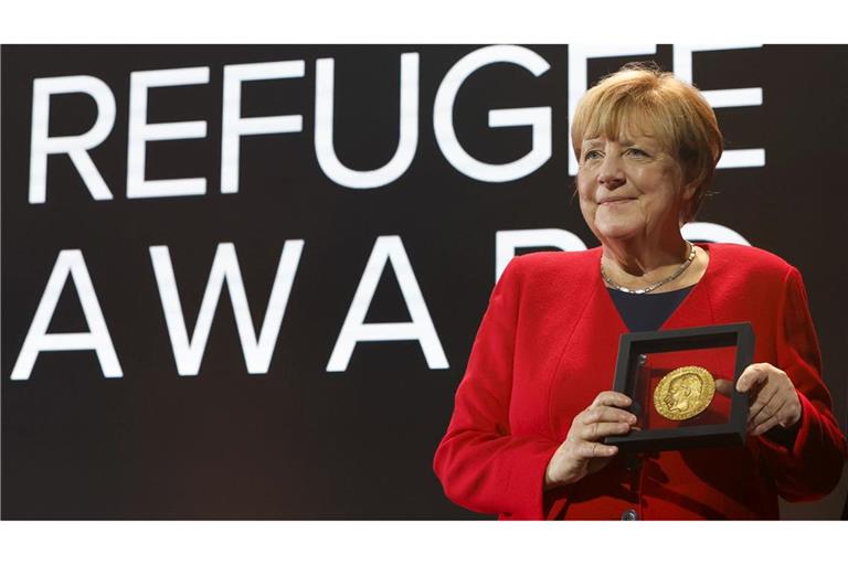 Merkel bei einer Preisverleihung für ihre Flüchtlingspolitik