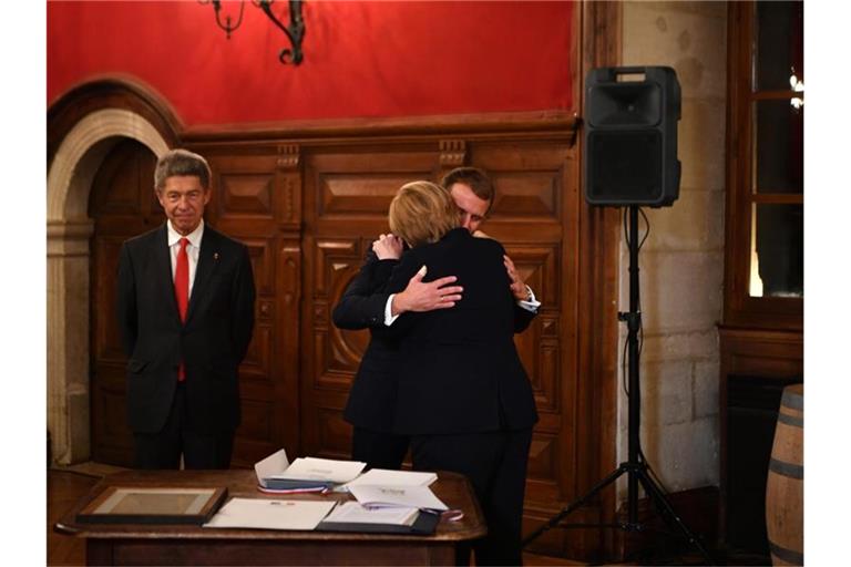 Merkel stattete Frankreich am Mittwoch einen Abschiedsbesuch ab. Foto: Philippe Desmazes/AFP POOL via AP/dpa
