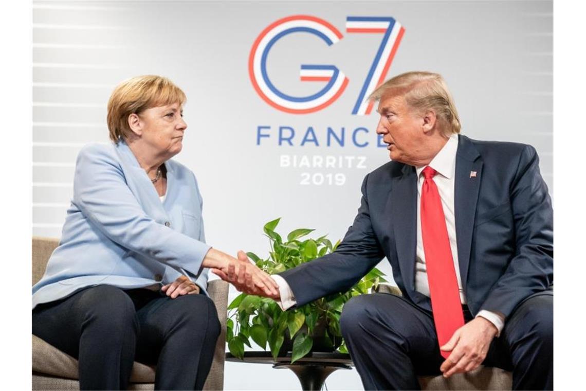 G7-Gipfel: Bewegung im Iran-Konflikt und in Handelsfragen Merkel und Trump bei bilateralen Gesprächen am Rande des G7-Gipfels. Foto: Michael Kappeler