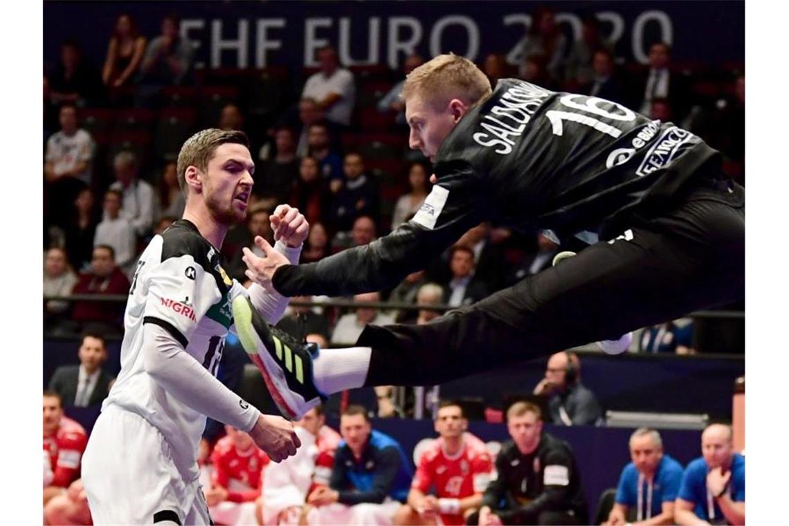 DHB-Auswahl bei EM angekommen: Gründe für den Aufschwung Mit einem 31:23 setzte sich Deutschland gegen Weißrussland durch. Foto: Robert Michael/dpa-Zentralbild/dpa