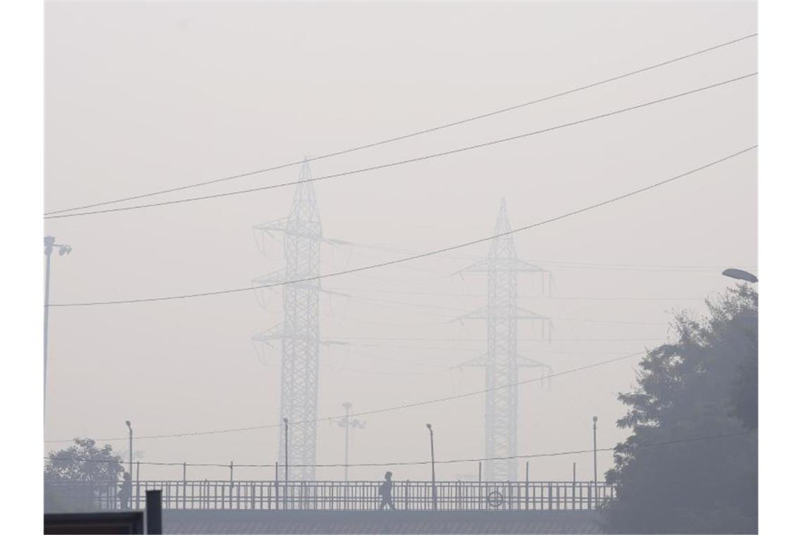 Morgendlicher Dunst und giftige Smog in Neu Delhi. Foto: Manish Swarup/AP/dpa