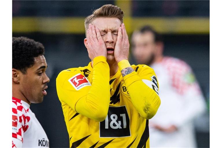 Muss gegen Hoffenheim zuerst auf der Bank Platz nehmen: BVB-Kapitän Marco Reus. Foto: Guido Kirchner/dpa-Pool/dpa