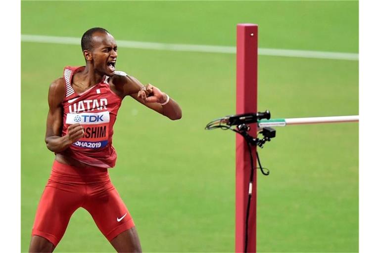 Mutaz Essa Barshim aus Katar feiert seinen Sieg im Hochsprung. Foto: Martin Meissner/AP/dpa