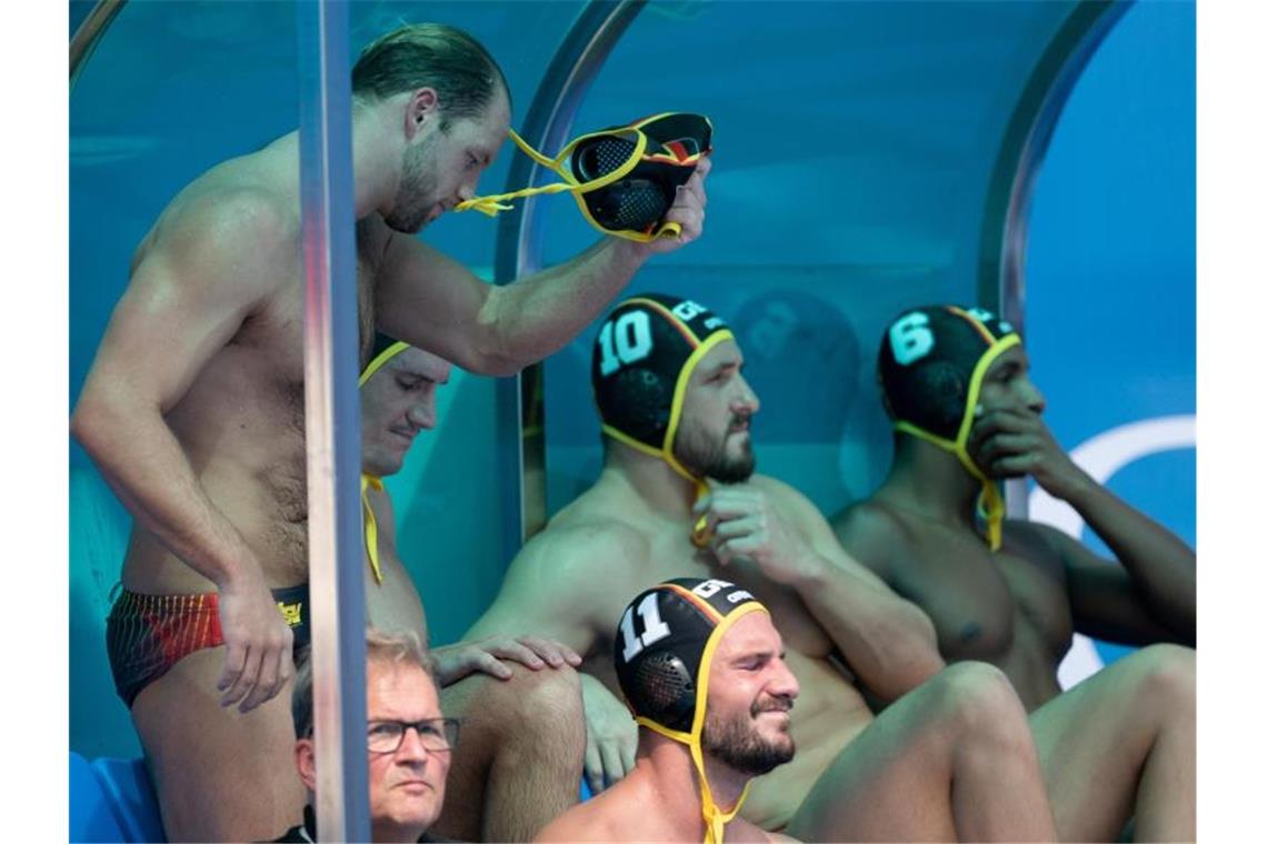 Nach dem letzten Fünfmeter zeigen die deutschen Wasserballer ihre Enttäuschung. Foto: Bernd Thissen